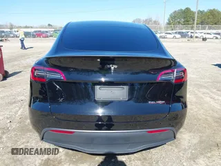 2021 Tesla Model Y Performance with VIN 5YJYGDEF6MF252877, listed as a IAAI auction lot 41770770 with 58,550 mi miles and . Bid and sale history available at DreamBid. Image 16.