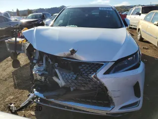 2020 Lexus RX with VIN 2T2AGMDA1LC045416, listed as a Copart auction lot 87016254 with 47,355 mi miles and Salvage Title. Bid and sale history available at carsss.com. Image 5.