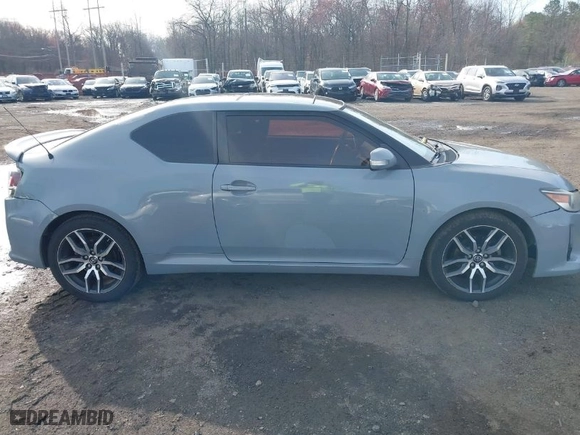 2014 Scion tC with VIN JTKJF5C71E3081033, listed as a IAAI auction lot 41928949 with 144,112 mi miles. Bid and sale history available at carsss.com. Image 13.