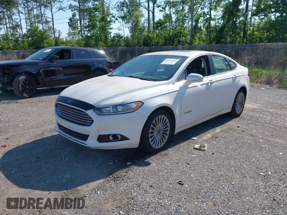 2014 Ford Fusion Titanium Hybrid with VIN 3FA6P0RU3ER279212, listed as a IAAI auction lot 42241465 with 155,841 mi miles and . Bid and sale history available at DreamBid. Image 2.