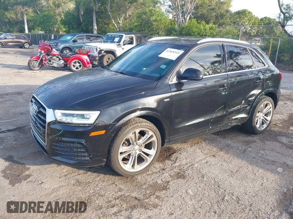 2018 Audi Q3 Premium Plus z VIN WA1HCCFS3JR022277, wystawiony jako IAAI lot #42468345 z przebiegiem 78 225 mil mil oraz . Historia ofert i sprzedaży dostępna na DreamBid. Obrazek 19.