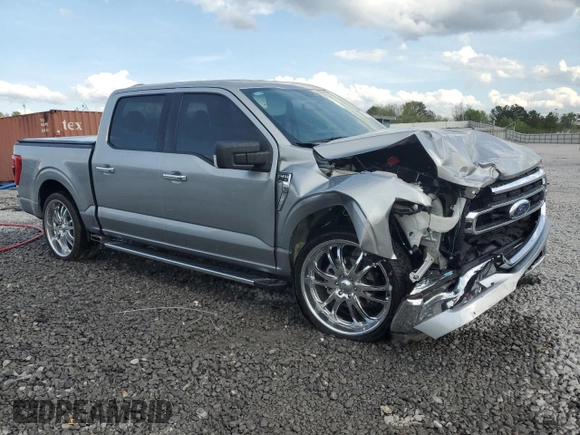 2023 Ford F-150 XL with VIN 1FTEW1C50PKF91124, listed as a Copart auction lot 51538865 with 22,128 mi miles and Salvage title. Bid and sale history available at DreamBid. Image 4.