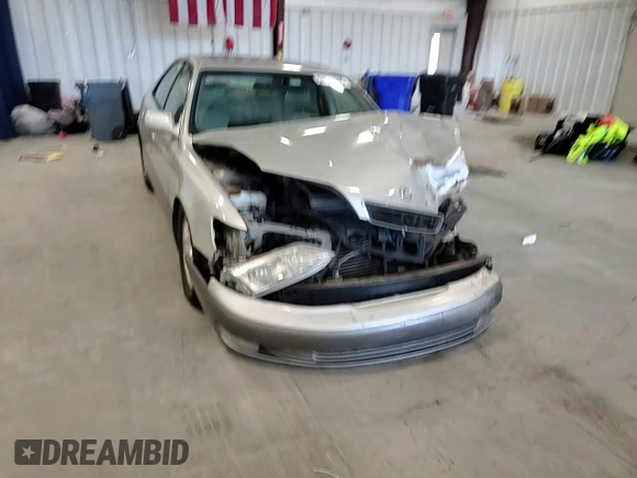 1999 Lexus ES 300 с VIN JT8BF28GXX0235471, выставлен на аукционе Copart как лот 57982605 с пробегом 187 958 миль миль и Списание • Salvage title. История ставок и продаж доступна на DreamBid. Изображение 13.