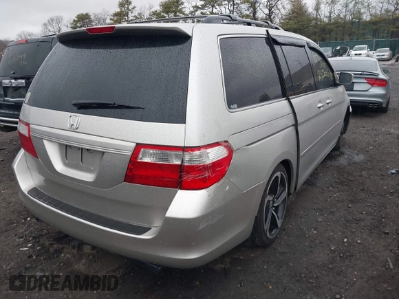 2005 Honda Odyssey EX-L with VIN 5FNRL38645B417008, listed as a IAAI auction lot 41870386 with Not Provided miles and . Bid and sale history available at carsss.com. Image 4.