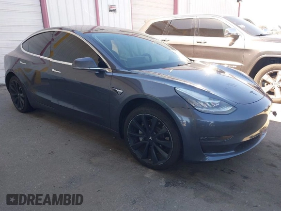 2018 Tesla Model 3 Long Range Battery with VIN 5YJ3E1EA7JF163401, listed as a IAAI auction lot 41829681 with 90,065 mi miles. Bid and sale history available at carsss.com. Image 1.