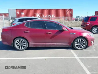 2015 Kia Optima SX Turbo with VIN 5XXGR4A64FG396164, listed as a IAAI auction lot 41682721 with 143,420 mi miles. Bid and sale history available at carsss.com. Image 14.