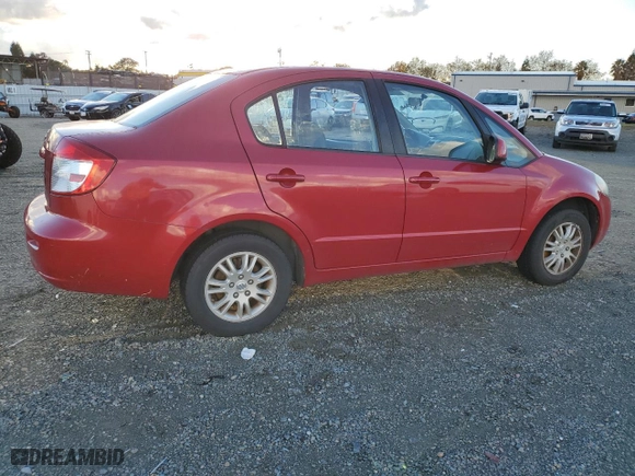 2013 Suzuki SX4 LE with VIN JS2YC5A37D6101819, listed as a Copart auction lot 82367044 with 142,932 mi miles and Salvage Title. Bid and sale history available at carsss.com. Image 3.