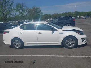 2014 Kia Optima LX z VIN KNAGM4AD8E5076052, wystawiony jako IAAI lot #42170715 z przebiegiem 111 448 mil mil oraz . Historia ofert i sprzedaży dostępna na DreamBid. Obrazek 13.