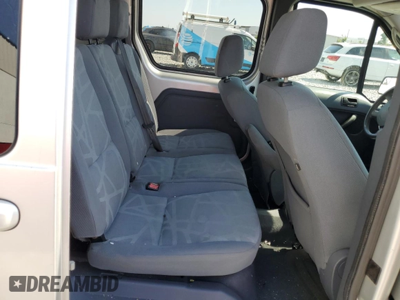 2013 Ford Transit Connect XLT with VIN NM0KS9BN1DT158199, listed as a Copart auction lot 56930665 with 191,534 mi miles and Salvage title. Bid and sale history available at DreamBid. Image 11.