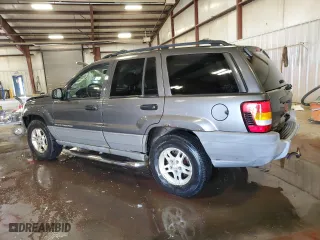 2002 Jeep Grand Cherokee Laredo with VIN 1J4GW48N52C240077, listed as a Copart auction lot 55919394 with 223,991 mi miles and Clean Title. Bid and sale history available at carsss.com. Image 2.