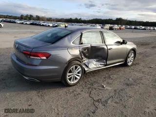 2020 Volkswagen Passat 2.0T SE with VIN 1VWSA7A33LC014563, listed as a Copart auction lot 73009942 with 66,636 mi miles. Bid and sale history available at carsss.com. Image 3.