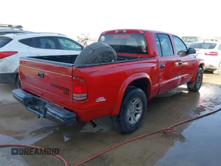 2003 Dodge Dakota Sport with VIN 1D7HL38X63S362491, listed as a IAAI auction lot 41642370 with 299,300 mi miles. Bid and sale history available at carsss.com. Image 4.