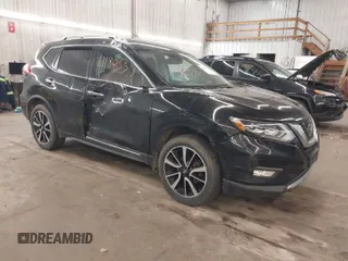 2018 Nissan Rogue SV z VIN JN8AT2MV4JW324603, wystawiony jako IAAI lot #41803319 z przebiegiem 103 777 mil mil oraz . Historia ofert i sprzedaży dostępna na DreamBid. Obrazek 1.