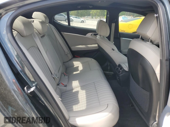 2023 Genesis G70 2.0T with VIN KMTG34TA4PU120566, listed as a Copart auction lot 53307455 with 31,933 mi miles and Salvage title. Bid and sale history available at DreamBid. Image 10.