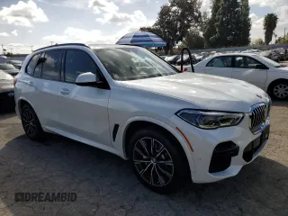 2022 BMW X5 sDrive40i with VIN 5UXCR4C06N9K56344, listed as a Copart auction lot 47600815 with 19,592 mi miles and Salvage Title. Bid and sale history available at carsss.com. Image 4.