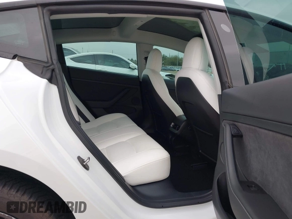 2021 Tesla Model 3 Long Range with VIN 5YJ3E1EB3MF059713, listed as a IAAI auction lot 41778289 with 52,211 mi miles. Bid and sale history available at carsss.com. Image 8.