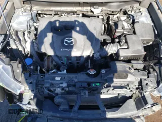 2021 Mazda CX-3 Touring z VIN JM1DKFC78M1508479, wystawiony jako Copart lot #61866195 z przebiegiem 73 746 mil mil oraz Szkoda całkowita • Salvage title. Historia ofert i sprzedaży dostępna na DreamBid. Obrazek 11.