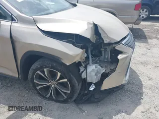 2017 Lexus RX 350 z VIN 2T2BZMCA5HC099468, wystawiony jako IAAI lot #42236279 z przebiegiem 150 005 mil mil oraz . Historia ofert i sprzedaży dostępna na DreamBid. Obrazek 6.
