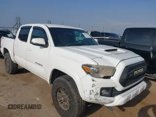 2017 Toyota Tacoma SR5 with VIN 5TFAZ5CNXHX026607, listed as a IAAI auction lot 42356462 with 213,010 mi miles and . Bid and sale history available at DreamBid. Image 1.