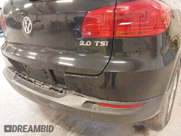 2014 Volkswagen Tiguan SE z VIN WVGAV3AX9EW614094, wystawiony jako IAAI lot #42350601 z przebiegiem 128 996 mil mil oraz . Historia ofert i sprzedaży dostępna na DreamBid. Obrazek 18.