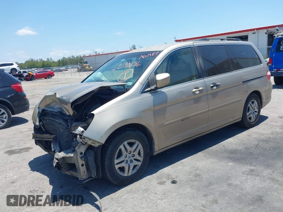 2005 Honda Odyssey EX with VIN 5FNRL38495B401742, listed as a IAAI auction lot 42133434 with 162,161 mi miles and . Bid and sale history available at carsss.com. Image 2.