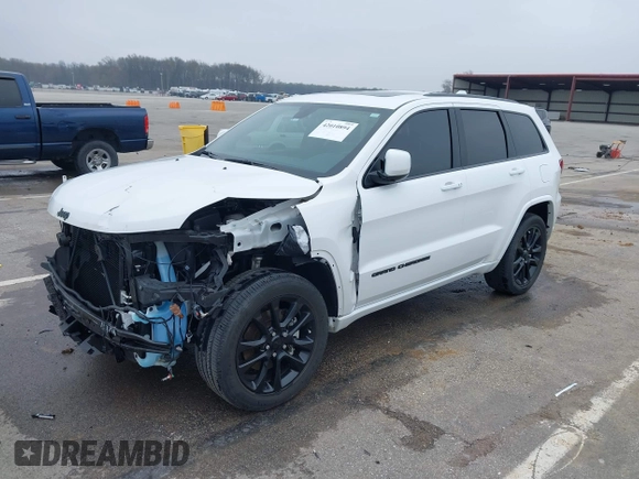 2021 Jeep Grand Cherokee Laredo E with VIN 1C4RJEAG7MC713026, listed as a IAAI auction lot 42010894 with 37,336 mi miles and . Bid and sale history available at DreamBid. Image 21.