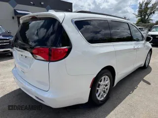 2020 Chrysler Voyager LXI with VIN 2C4RC1DG9LR144605, listed as a Copart auction lot 54107585 with 140,575 mi miles and Salvage Title. Bid and sale history available at carsss.com. Image 3.