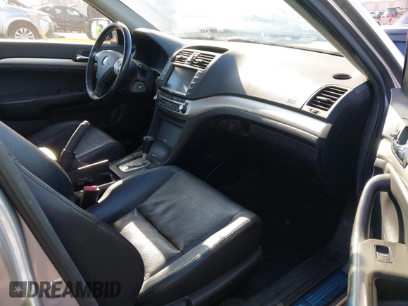 2004 Acura TSX w/Navigation with VIN JH4CL96944C002982, listed as a IAAI auction lot 41855710 with 165,129 mi miles. Bid and sale history available at carsss.com. Image 5.