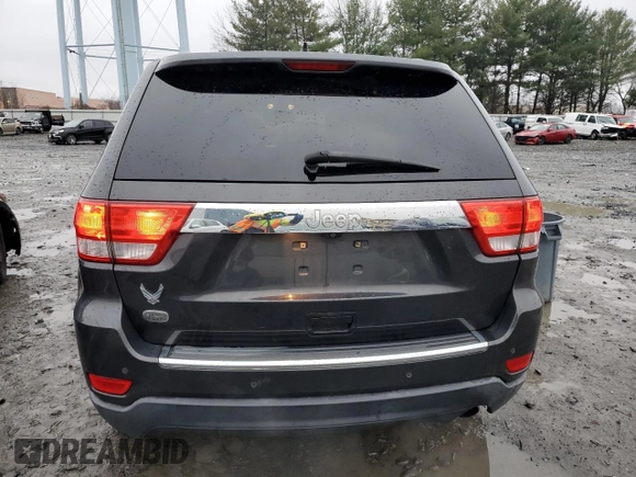 2011 Jeep Grand Cherokee Overland with VIN 1J4RS6GG5BC588562, listed as a Copart auction lot 84805424 with 150,030 mi miles and Salvage Title. Bid and sale history available at DreamBid. Image 6.