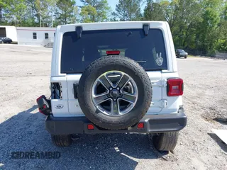 2019 Jeep Wrangler Unlimited Sahara with VIN 1C4HJXEN5KW509806, listed as a IAAI auction lot 42071325 with 95,549 mi miles and . Bid and sale history available at DreamBid. Image 17.