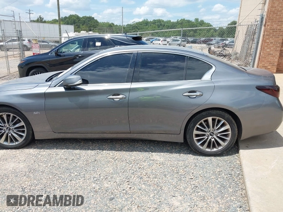 2019 Infiniti Q50 Luxe z VIN JN1EV7APXKM519048, wystawiony jako IAAI lot #42767526 z przebiegiem 99 705 mil mil oraz . Historia ofert i sprzedaży dostępna na DreamBid. Obrazek 14.