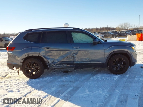 2022 Volkswagen Atlas 3.6L V6 SE w/Technology with VIN 1V2KR2CA2NC551937, listed as a IAAI auction lot 41288324 with 41,410 mi miles. Bid and sale history available at carsss.com. Image 13.