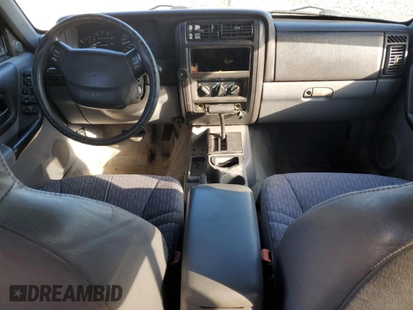 1998 Jeep Cherokee Sport with VIN 1J4FT68S0WL138603, listed as a Copart auction lot 86766454 with 0 mi miles and Salvage Title. Bid and sale history available at carsss.com. Image 8.