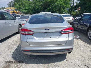 2017 Ford Fusion SE z VIN 3FA6P0HDXHR238713, wystawiony jako IAAI lot #42304140 z przebiegiem 157 630 mil mil oraz . Historia ofert i sprzedaży dostępna na DreamBid. Obrazek 16.