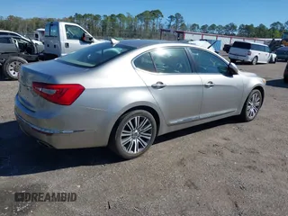 2014 Kia Cadenza Premium with VIN KNALN4D7XE5159404, listed as a IAAI auction lot 41811236 with 108,666 mi miles. Bid and sale history available at carsss.com. Image 4.
