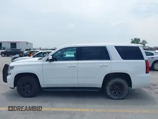 2018 Chevrolet Tahoe Commercial z VIN 1GNSKDEC8JR238969, wystawiony jako IAAI lot #42440047 z przebiegiem 126 373 mil mil oraz . Historia ofert i sprzedaży dostępna na DreamBid. Obrazek 14.