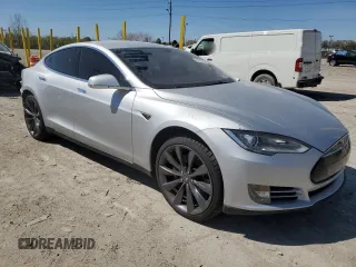 2013 Tesla Model S с VIN 5YJSA1CN5DFP05936, выставлен на аукционе Copart как лот 51831795 с пробегом Не указан миль и Списание • Salvage title. История ставок и продаж доступна на DreamBid. Изображение 4.