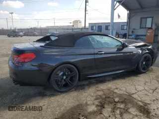 2016 BMW M6 z VIN WBS6G9C57GD932144, wystawiony jako Copart lot #72273744 z przebiegiem 71 614 mil mil oraz Szkoda całkowita • Salvage title. Historia ofert i sprzedaży dostępna na DreamBid. Obrazek 3.