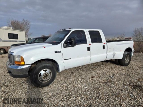 1999 Ford F-350 XL z VIN 1FTWW32F4XED65158, wystawiony jako Copart lot #41690765 z przebiegiem 147 314 mil mil oraz Czysty tytuł • Clean title. Historia ofert i sprzedaży dostępna na DreamBid. Obrazek 2.