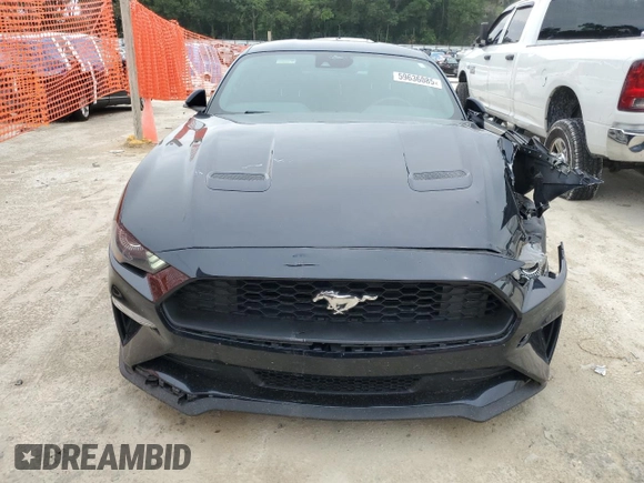 2021 Ford Mustang EcoBoost with VIN 1FA6P8TH7M5111908, listed as a Copart auction lot 59636085 with 57,667 mi miles and Salvage title. Bid and sale history available at DreamBid. Image 5.