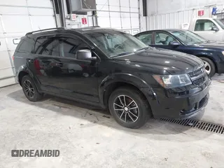 2017 Dodge Journey SE z VIN 3C4PDCAB1HT702007, wystawiony jako IAAI lot #42425324 z przebiegiem 109 859 mil mil oraz . Historia ofert i sprzedaży dostępna na DreamBid. Obrazek 1.