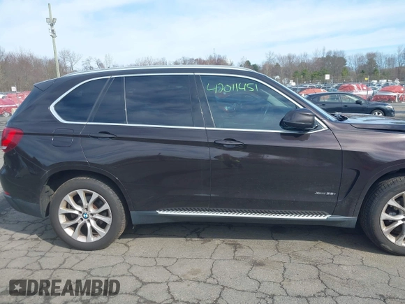2014 BMW X5 xDrive35i with VIN 5UXKR0C57E0H20944, listed as a IAAI auction lot 42011451 with 208,205 mi miles. Bid and sale history available at carsss.com. Image 13.
