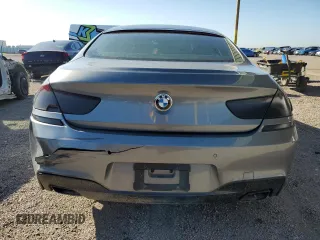 2014 BMW 6 Series 650i xDrive z VIN WBA6B4C53ED371461, wystawiony jako Copart lot #51136055 z przebiegiem 143 213 mil mil oraz Tytuł czysty. Historia ofert i sprzedaży dostępna na DreamBid. Obrazek 6.