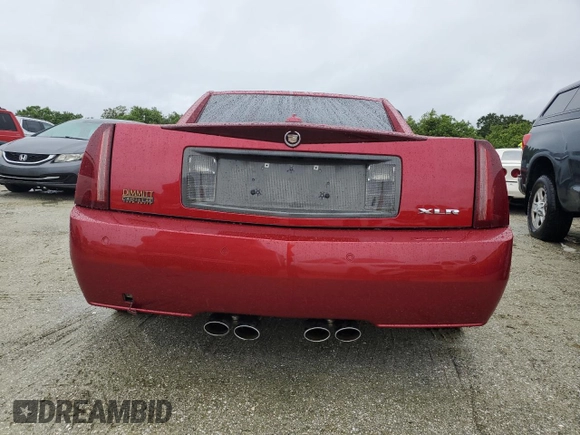 2005 Cadillac XLR z VIN 1G6YV34AX55600837, wystawiony jako Copart lot #75055604 z przebiegiem Nie podano mil oraz Szkoda całkowita • Salvage title. Historia ofert i sprzedaży dostępna na DreamBid. Obrazek 6.