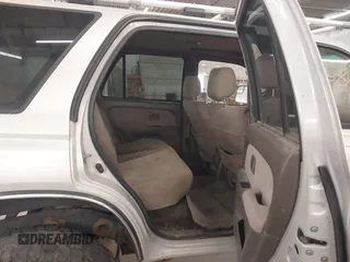 1998 Toyota 4Runner SR5 with VIN JT3HN86R1W0180174, listed as a IAAI auction lot 42065817 with 252,961 mi miles and . Bid and sale history available at DreamBid. Image 8.