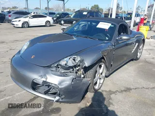 2007 Porsche Boxster with VIN WP0CA29857U711209, listed as a IAAI auction lot 41550294 with 86,012 mi miles. Bid and sale history available at carsss.com. Image 2.