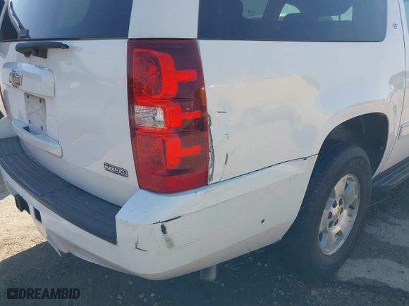 2009 Chevrolet Suburban LT w/2LT with VIN 1GNFC26089R273028, listed as a IAAI auction lot 41669345 with 244,869 mi miles. Bid and sale history available at carsss.com. Image 13.