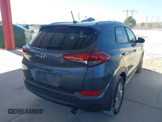 2017 Hyundai Tucson SE with VIN KM8J33A4XHU438510, listed as a IAAI auction lot 42021812 with 117,848 mi miles. Bid and sale history available at carsss.com. Image 4.