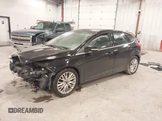 2017 Ford Focus Titanium with VIN 1FADP3N25HL222297, listed as a IAAI auction lot 41698707 with 121,756 mi miles and . Bid and sale history available at carsss.com. Image 2.