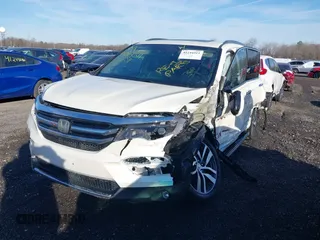 2017 Honda Pilot Touring with VIN 5FNYF6H98HB102313, listed as a IAAI auction lot 41244311 with 106,931 mi miles. Bid and sale history available at carsss.com. Image 18.